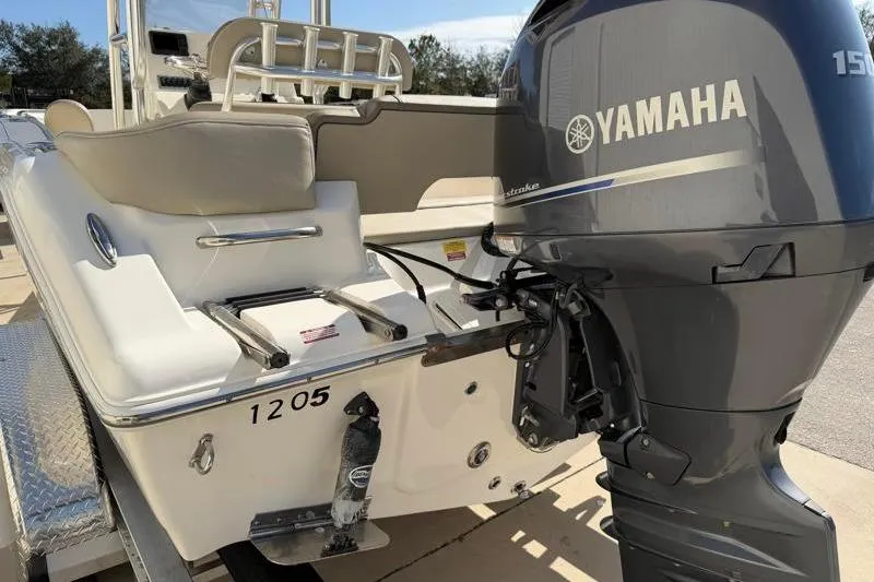 Slide: The Image of 2023 Key West 203 FS boat with Yamaha outboard motor, rear view. - 11