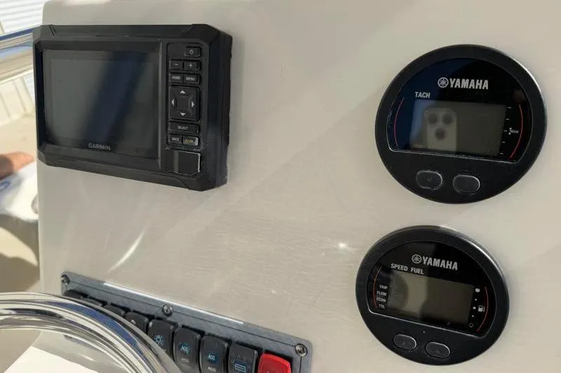Slide: The Image of Dashboard of 2023 Key West 203 FS boat with Garmin and Yamaha gauges. - 27