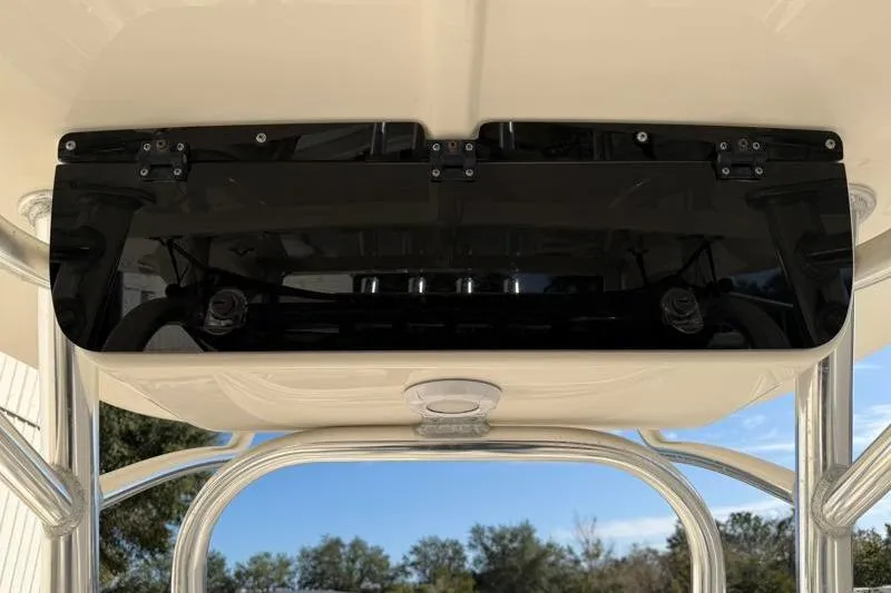 Slide: The Image of 2023 Key West 203 FS boat console with black panel and stainless steel frame. - 30