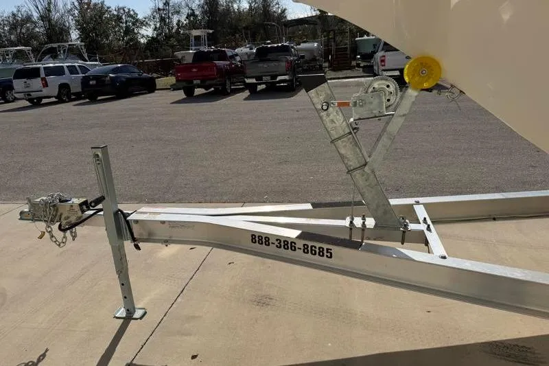 Slide: The Image of Trailer for 2023 Key West 203 FS boat parked in a lot. - 41