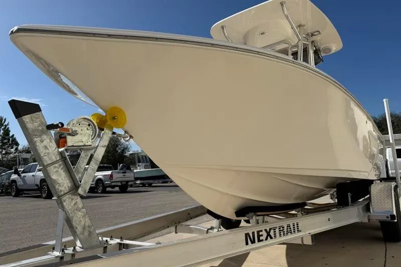 Slide: The Image of 2023 Key West 203 FS boat on Nextrail trailer, parked outdoors. - 9