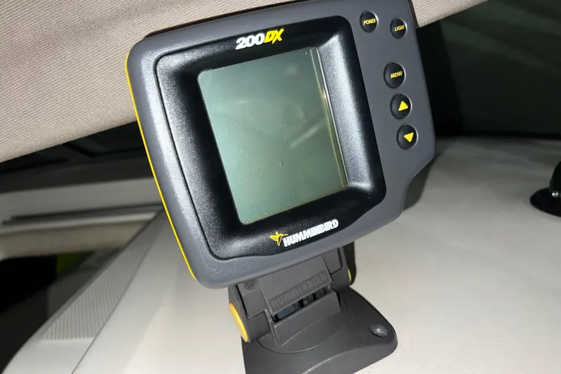 Slide: The Image of Humminbird 200DX fish finder on 2003 Sea Ray 225 Weekender boat dashboard. - 11