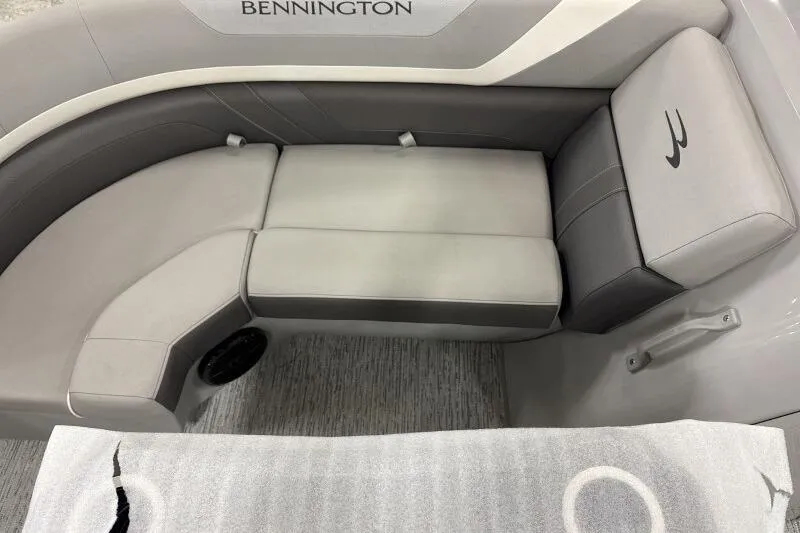Slide: The Image of Luxurious seating on 2026 Bennington 22SXSR boat, featuring elegant gray upholstery. - 11