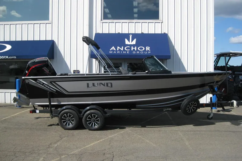 Slide: The Image of 2026 Lund 2075 Fisherman boat on trailer at Anchor Marine Group. - 1