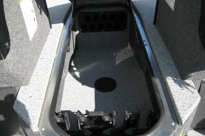 Slide: The Image of Interior view of 2026 Lund 2075 Fisherman boat storage compartment. - 17