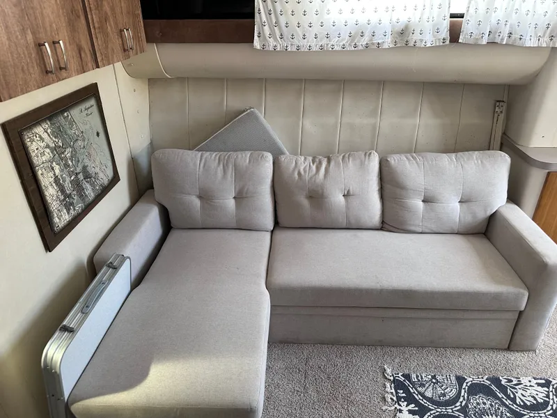 Slide: The Image of Bimini top of a 1995 Mainship 40 Sport Sedan boat. - 13