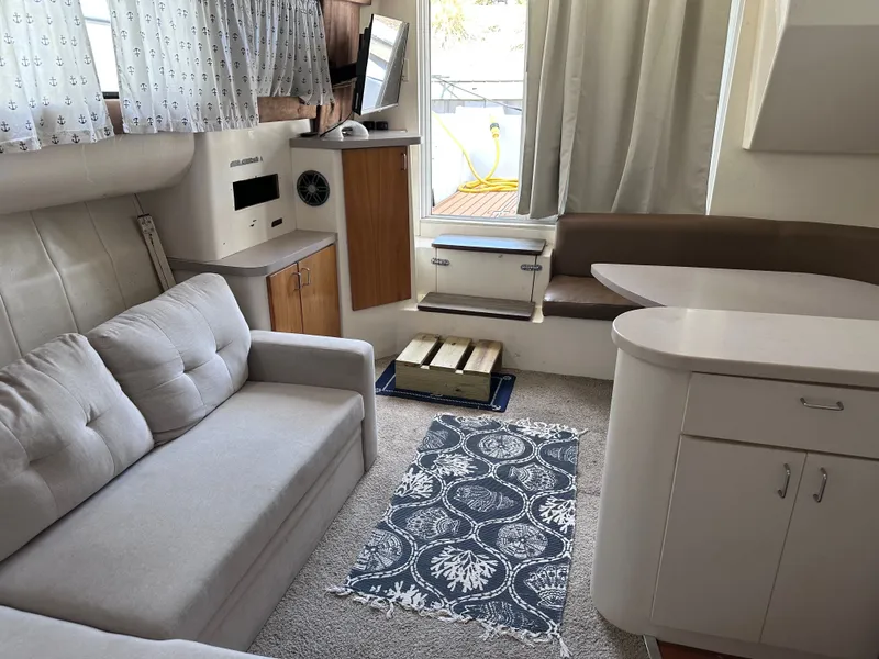 Slide: The Image of 1995 Mainship 40 Sport Sedan docked with wooden deck. - 16