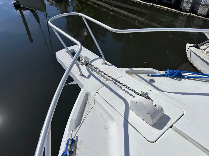 Slide: The Image of 1995 Mainship 40 Sport Sedan at dock, view of bow deck. - 4