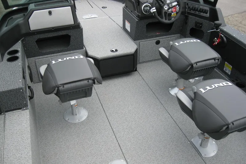 Slide: The Image of Interior of 2025 Lund 1875 Impact XS Sport boat with two branded seats. - 7