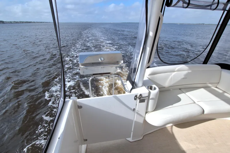 Slide: The Image of 2006 Silverton 39 Motor Yacht interior with seating and water view. - 14