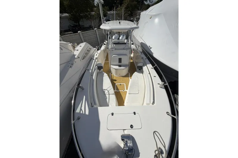 Slide: The Image of 2014 Tidewater 250 CC Adventure boat with spacious deck and seating. - 33