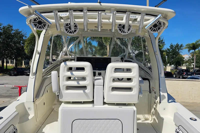 Slide: The Image of 2008 Hydra-Sports Vector 3500 VX boat interior with seating and rod holders. - 17