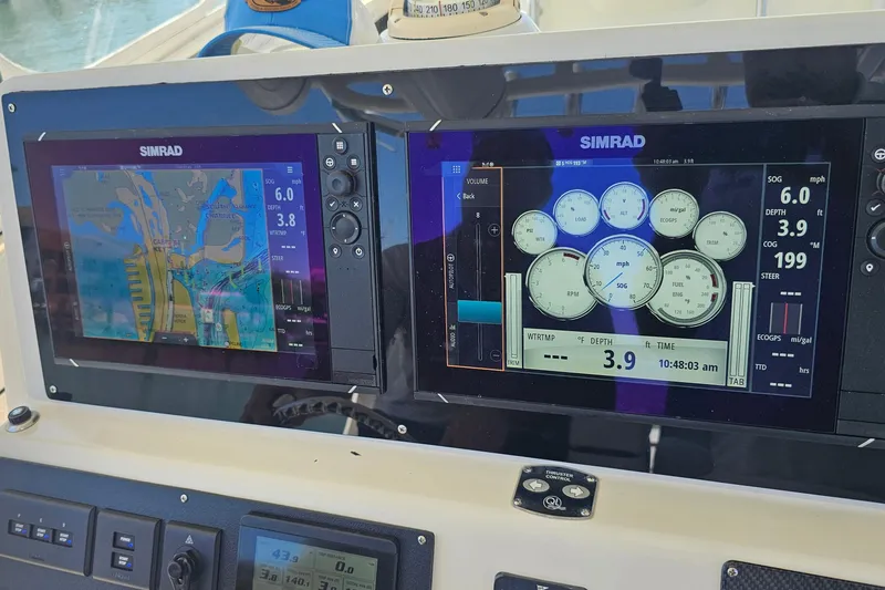 Slide: The Image of Simrad navigation displays on 2008 Hydra-Sports Vector 3500 VX boat dashboard. - 20