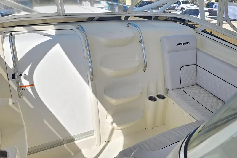Slide: The Image of 2008 Hydra-Sports Vector 3500 VX interior with seating and cup holders. - 27