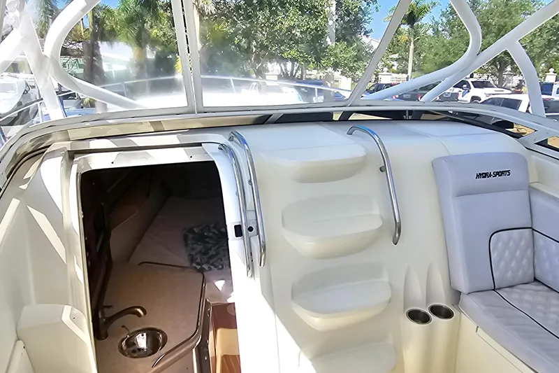 Slide: The Image of 2008 Hydra-Sports Vector 3500 VX boat interior with seating and cabin entrance. - 29