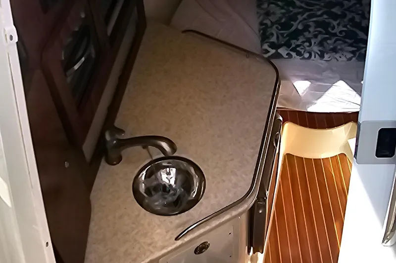 Slide: The Image of 2008 Hydra-Sports Vector 3500 VX cabin interior with sink and bed. - 36