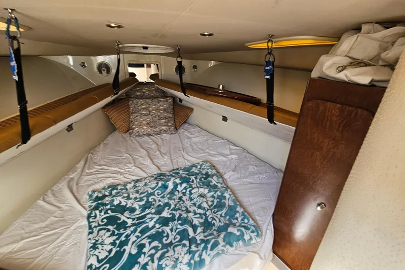 Slide: The Image of 2008 Hydra-Sports Vector 3500 VX cabin interior with bedding and storage. - 37