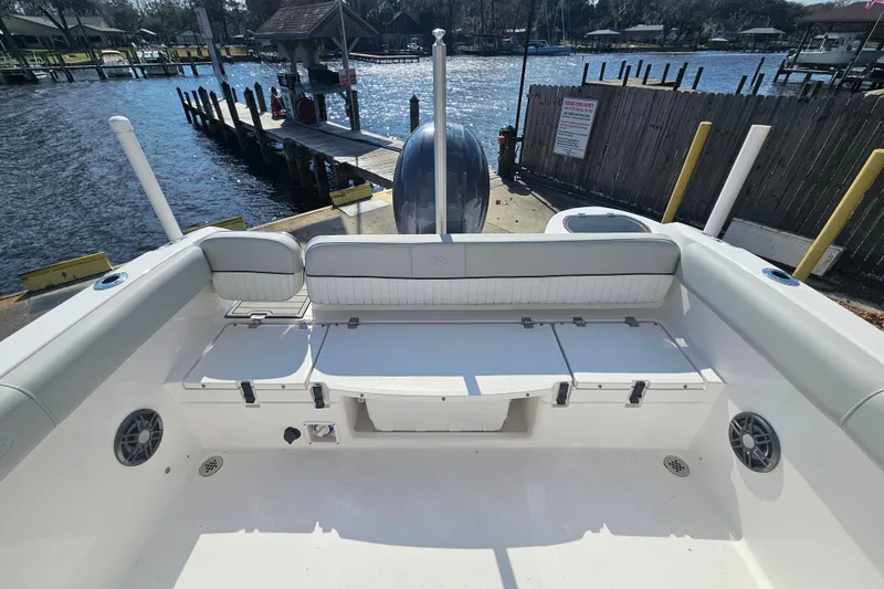 Slide: The Image of Sea Fox 226 Traveler 2022 boat with American flag in background. - 11