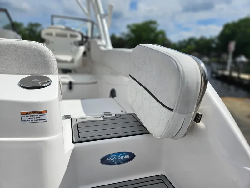 Slide: The Image of Close-up of control lever on a 2022 Sea Fox 226 Traveler boat. - 15