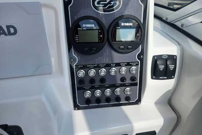 Slide: The Image of Captain's seat on 2022 Sea Fox 226 Traveler boat, featuring sleek design and comfortable upholstery. - 22