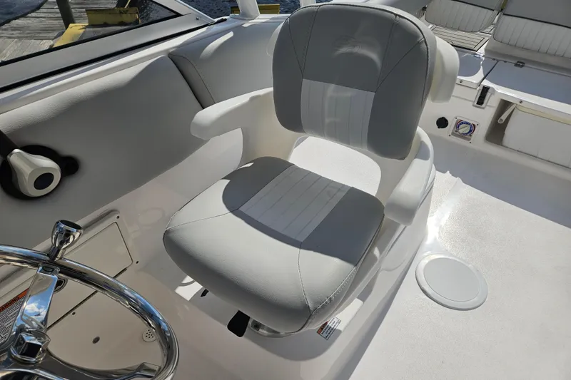 Slide: The Image of 2022 Sea Fox 226 Traveler boat roof with speakers, overlooking a scenic waterfront. - 23