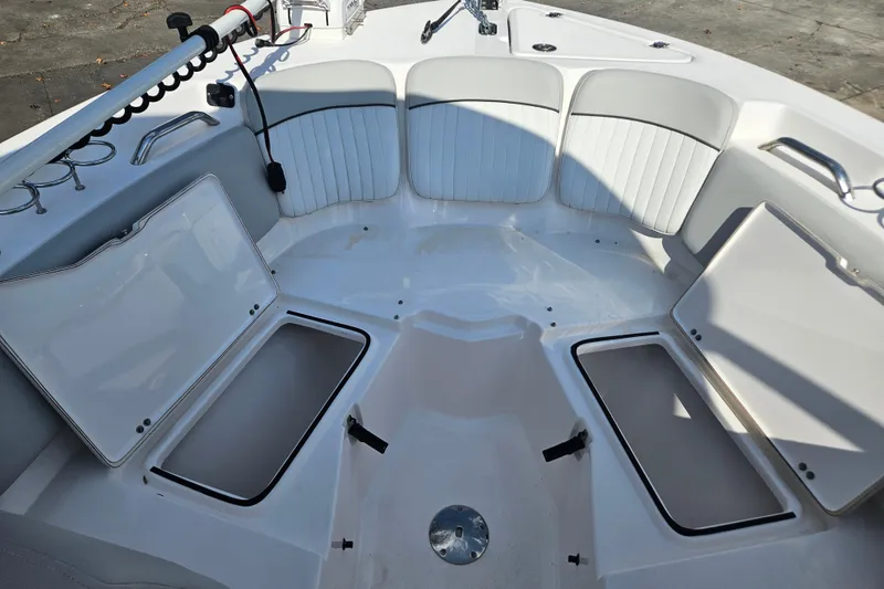 Slide: The Image of 2022 Sea Fox 226 Traveler boat interior with seating and storage compartments. - 27