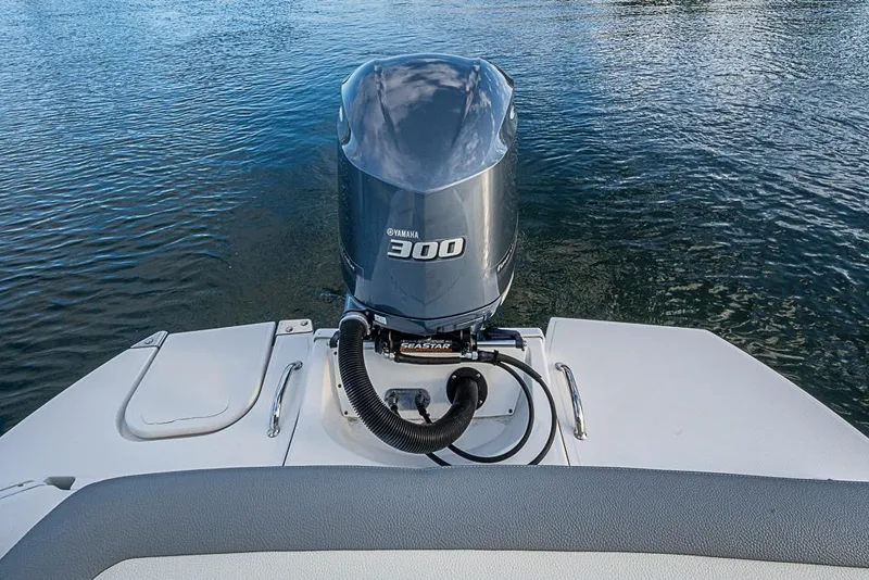 Slide: The Image of 2019 Cobalt 23SC boat with Yamaha 300 outboard motor on water. - 16