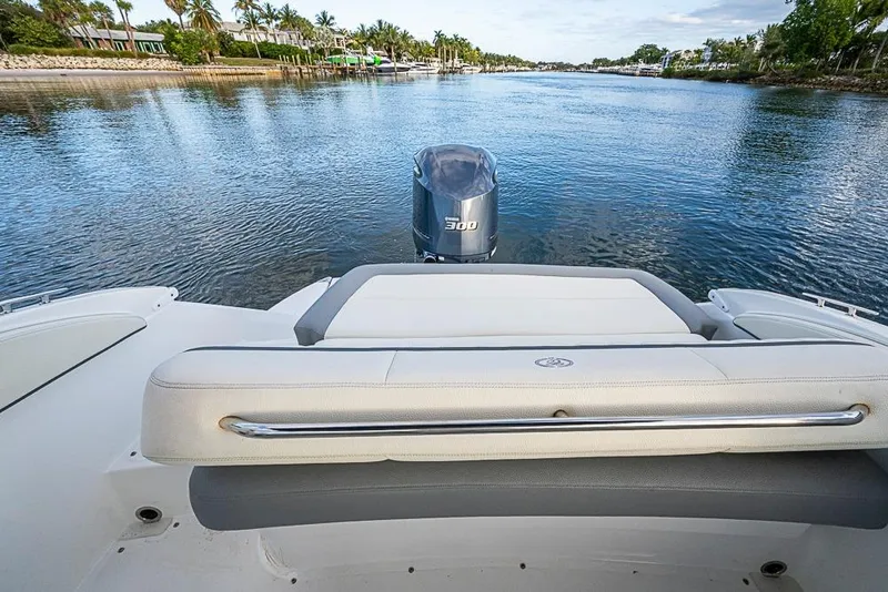Slide: The Image of 2019 Cobalt 23SC boat with Yamaha 300 engine on calm waterway. - 19