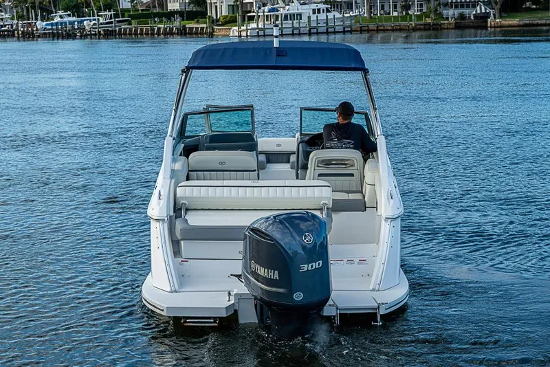 Slide: The Image of 2019 Cobalt 23SC boat with Yamaha 300 engine on calm water. - 3