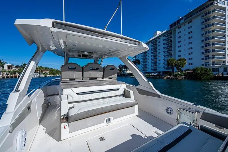 Slide: The Image of 2023 Tiara Yachts 34 LS luxury boat interior with waterfront view. - 43