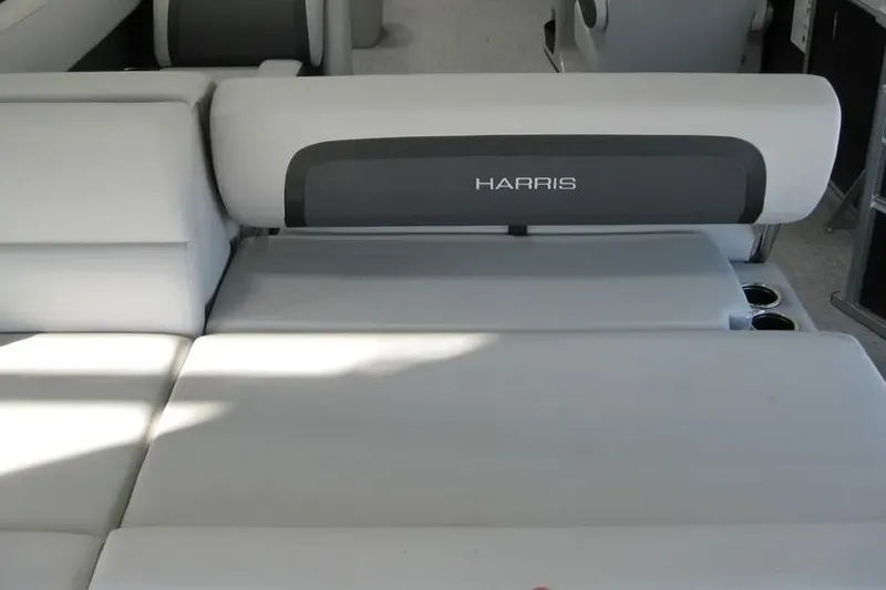 Slide: The Image of 2025 Harris FloteBote 230 Cruiser interior seating with cup holders. - 9