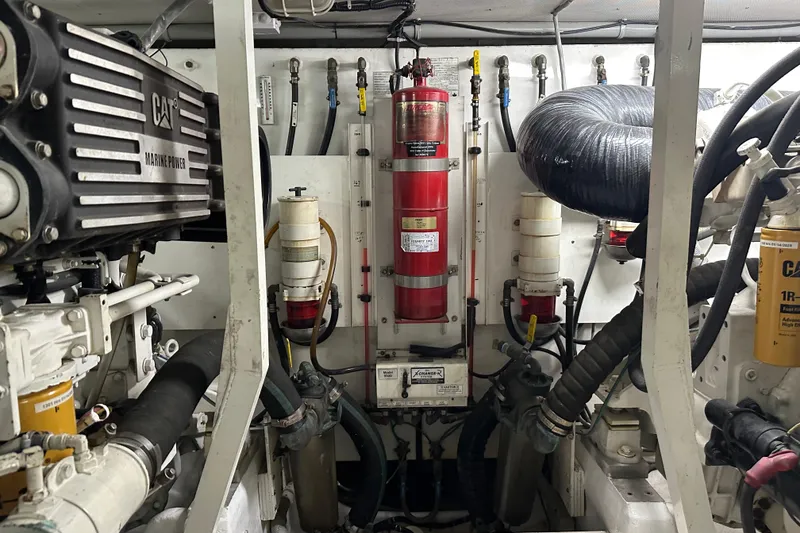 Slide: The Image of Engine room of 2006 Neptunus 56 Flybridge yacht with CAT marine power components. - 18