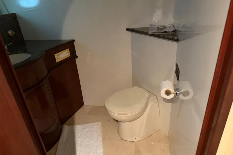 Slide: The Image of Bathroom interior of 2006 Neptunus 56 Flybridge yacht with toilet and sink. - 25