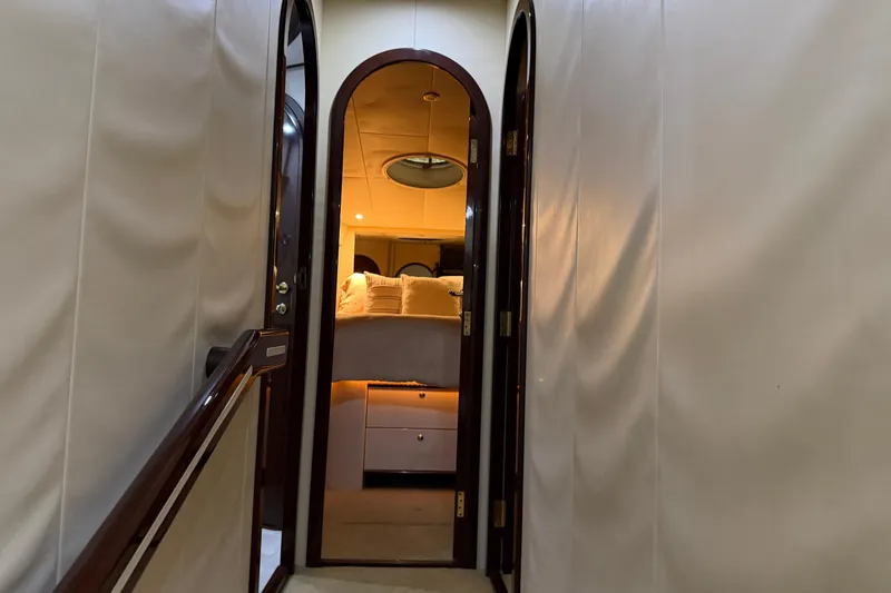 Slide: The Image of Interior hallway of 2006 Neptunus 56 Flybridge yacht, leading to a cozy bedroom. - 31