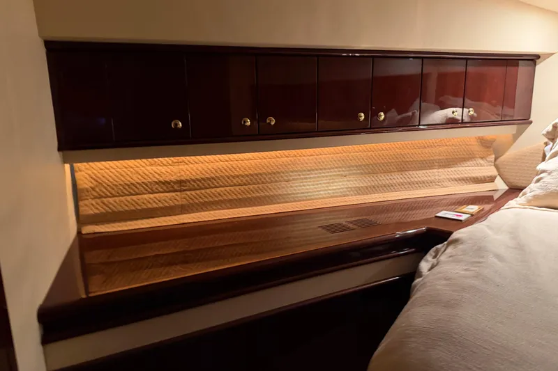 Slide: The Image of Luxurious interior of 2006 Neptunus 56 Flybridge yacht with elegant wood cabinetry. - 34