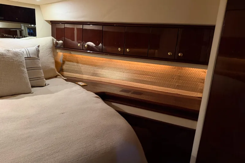 Slide: The Image of Luxurious cabin interior of 2006 Neptunus 56 Flybridge yacht with elegant wood cabinetry. - 35