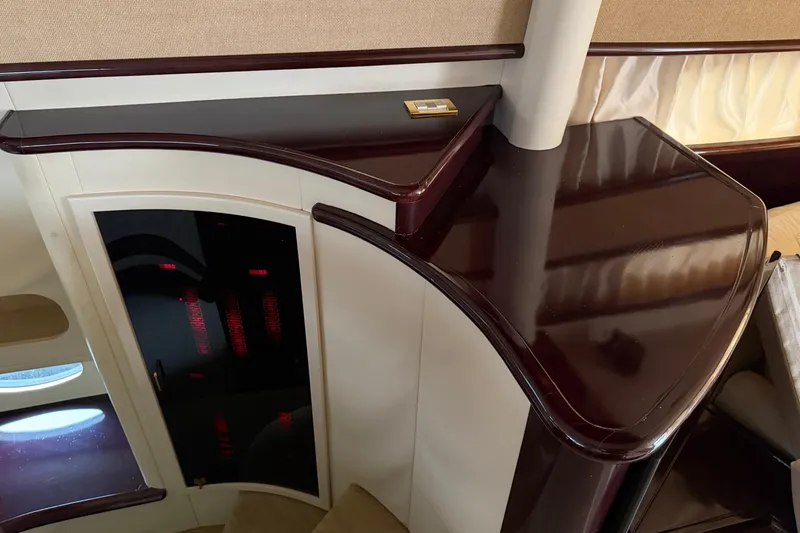 Slide: The Image of Luxurious interior of 2006 Neptunus 56 Flybridge yacht with polished wood finishes. - 50