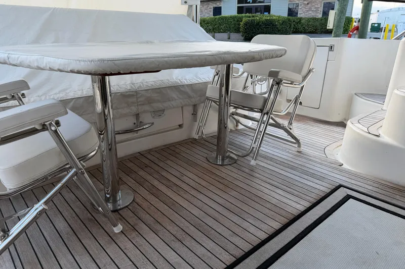 Slide: The Image of Luxury Neptunus 56 Flybridge yacht deck with seating, 2006 model. - 58