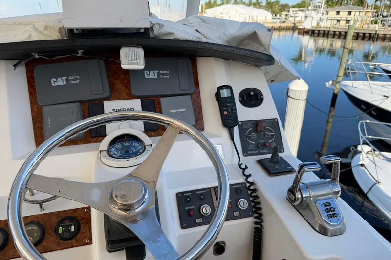 Slide: The Image of Helm of 2006 Neptunus 56 Flybridge yacht with CAT Marine Power controls. - 8