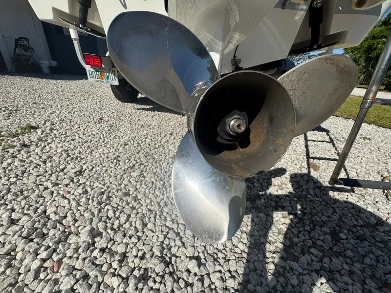 Slide: The Image of Propeller of a 2019 Mako 214C boat on gravel surface. - 13
