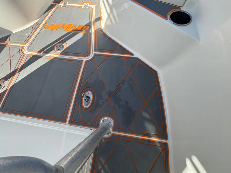Slide: The Image of 2019 Mako 214C boat deck with custom non-slip flooring and logo. - 39