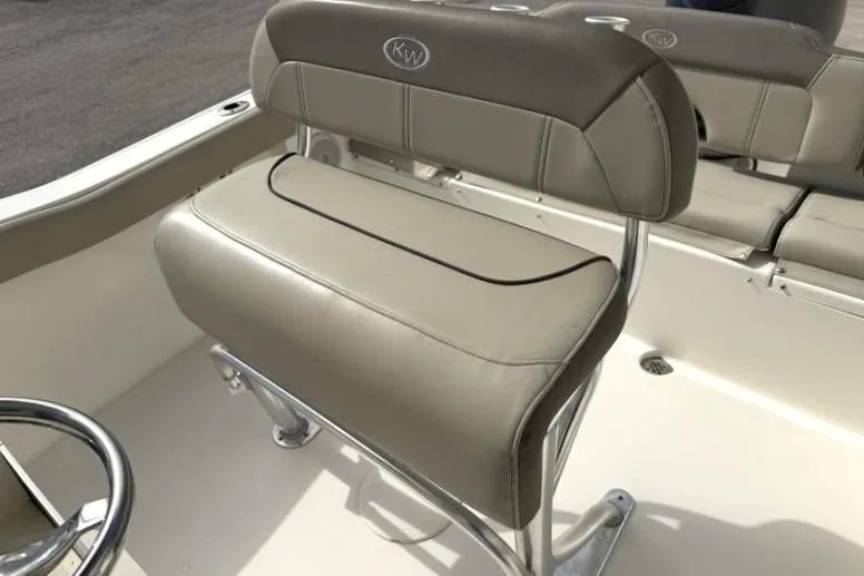 Slide: The Image of 2024 Key West 203 FS boat seat, beige upholstery, stainless steel frame. - 26