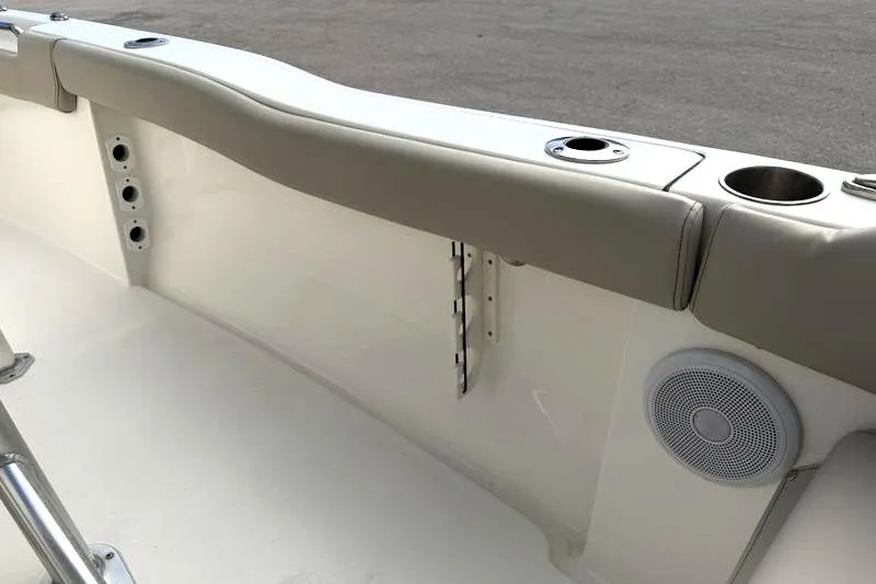 Slide: The Image of 2024 Key West 203 FS boat interior with cup holders and speaker. - 38