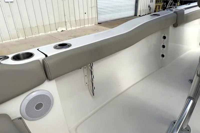 Slide: The Image of 2024 Key West 203 FS boat interior with cup holders and speaker. - 39