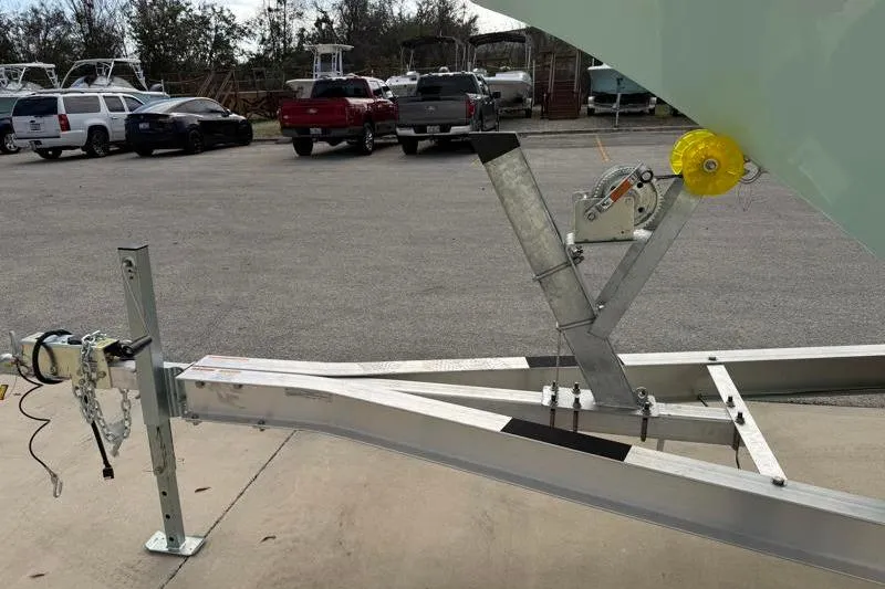 Slide: The Image of Trailer hitch of 2024 Key West 203 FS boat in parking lot. - 40
