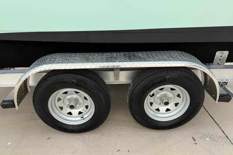 Slide: The Image of 2024 Key West 203 FS trailer with dual wheels and diamond plate fender. - 42