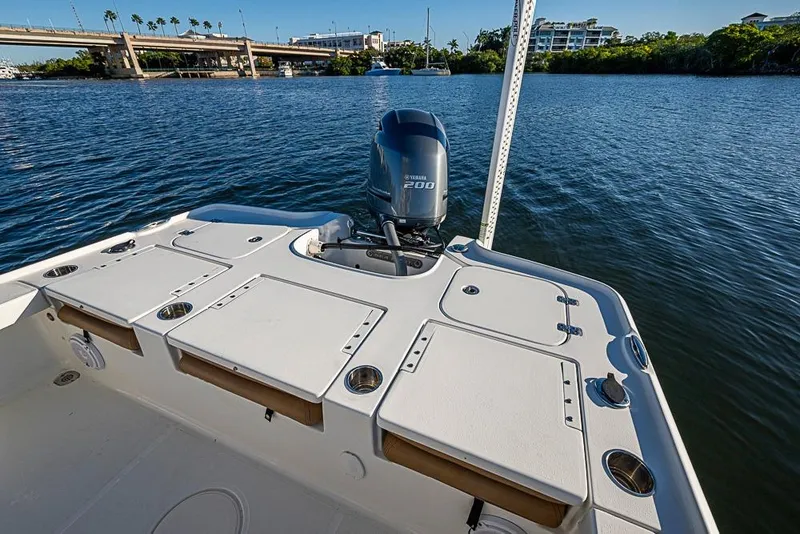 Slide: The Image of 2019 Sea Hunt BX 22 BR boat with Yamaha engine on calm water. - 23