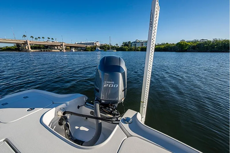 Slide: The Image of 2019 Sea Hunt BX 22 BR boat with Yamaha 200 engine on a scenic river. - 27