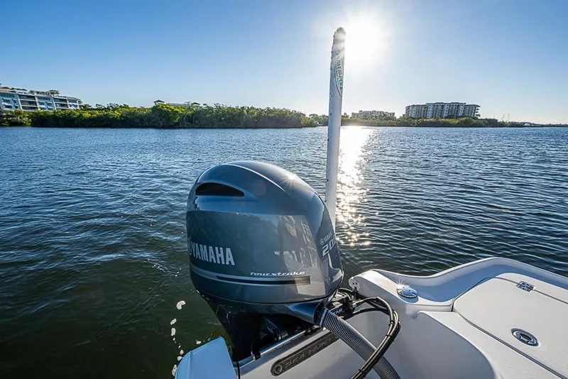 Slide: The Image of 2019 Sea Hunt BX 22 BR boat with Yamaha engine on a sunny lake. - 29