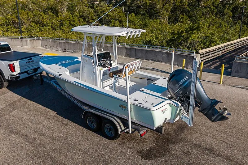 Slide: The Image of 2019 Sea Hunt BX 22 BR boat on trailer, attached to a GMC truck. - 41